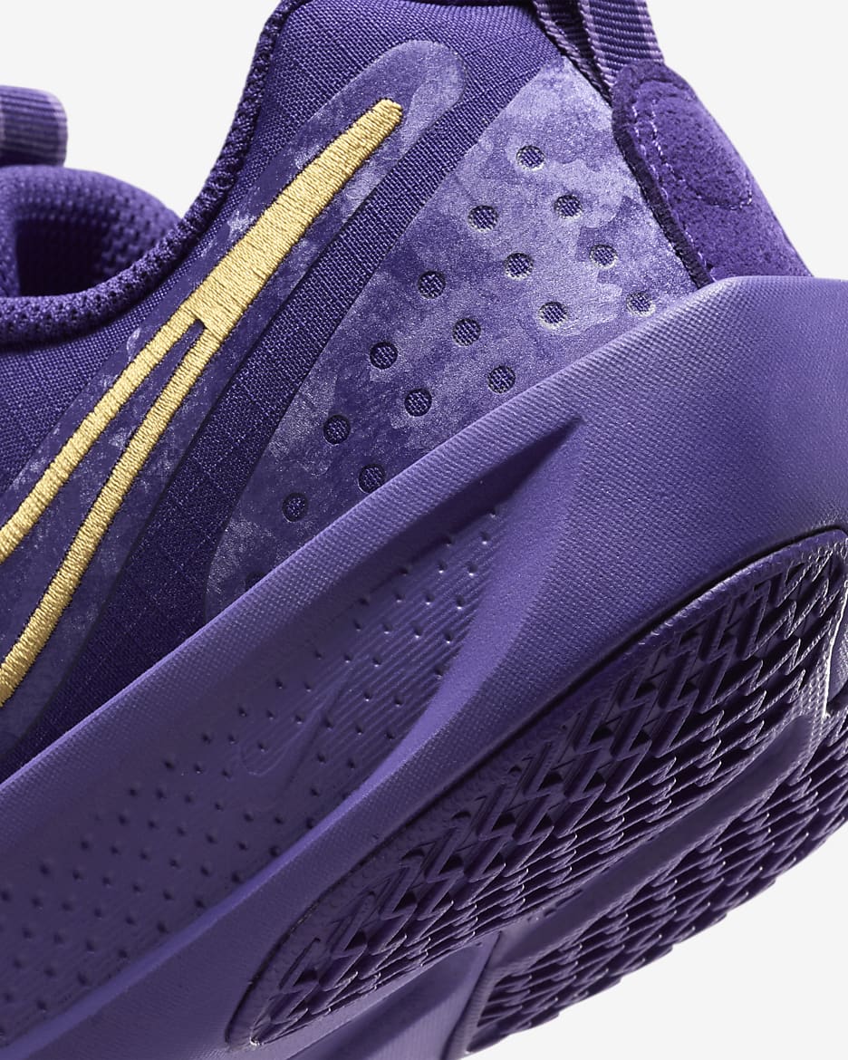 Nike purple and gold shoes hotsell